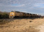 UP 7763  21Dec2012  WB with stacks along Quintanilla Road